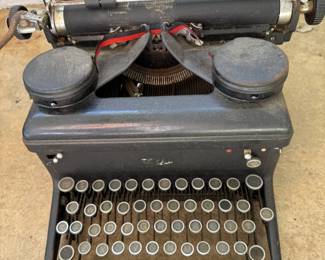 Antique typewriter. Great for staging and a nice prop. 