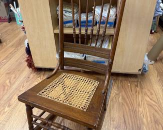 pressed-back cane seat rocking chair