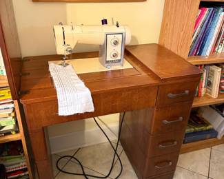 Sears Kenmore sewing machine - Built-in flip-top cabinet