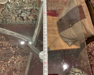 Glass top rectangular dining table with chrome crisscross legs $1250 + tax