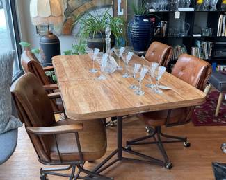 MCM laminate dining set with removable leave and leather executive chairs $2000 + tax