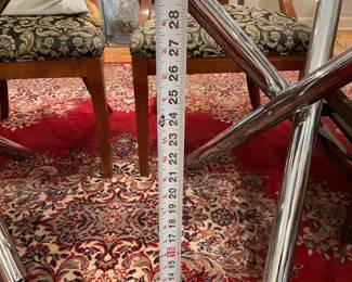 Glass top rectangular dining table with chrome crisscross legs $1250 + tax