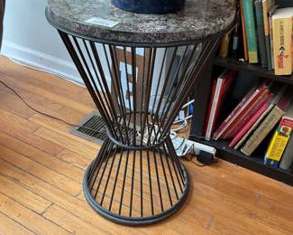 Round side table with black spokes and stone patterned resin top $100 + tax