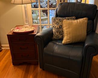 Like new blue leather elevating recliner.