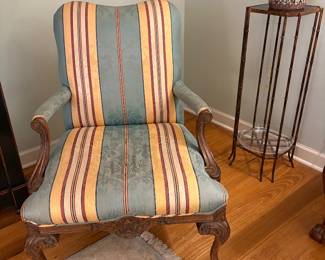 One of a pair of classic arm chairs.