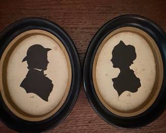 Pair of Oval Silhouette Portraits in Gilt Frames