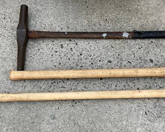 Three Hand Tools Including Two Pickaxes and One Sledgehammer