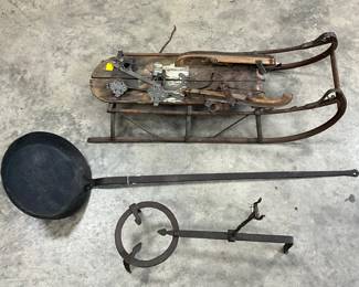 Vintage Wooden Sled, Cast Iron Long-Handled Pan, And Metal Trivet Set