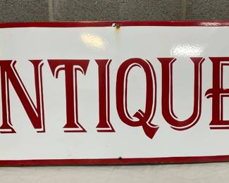 Porcelain Advertising Sign with ‘Antiques’ Text, 43×17 Inches