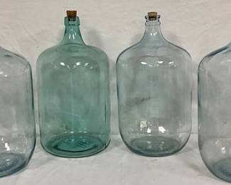 Four Glass Water Jugs with Cork Stoppers