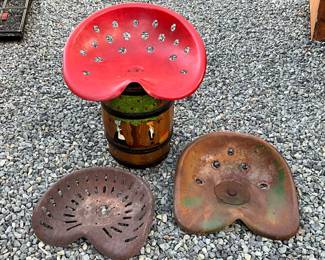 Three Early Cast Iron Tractor Seats 