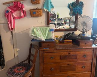 Beautiful antique dresser w mirror has marble inlay on top of dresser some vintage kids clothing 