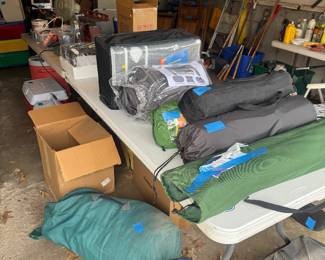 Camping or hiking gear , cots, pads for cots, sleeping bag, several tents 
