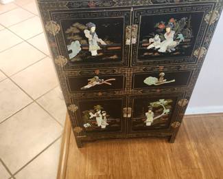 Oriental design chest with two drawers and four doors (24 x 16 x 36)