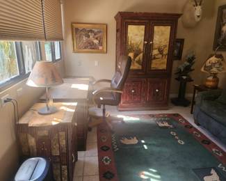 Unique wood office furniture with wildlife art. Includes desk, two side tables and entertainment center.