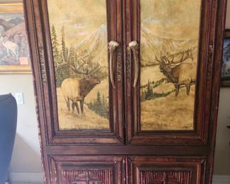 Unique wood office furniture with wildlife art: entertainment center.