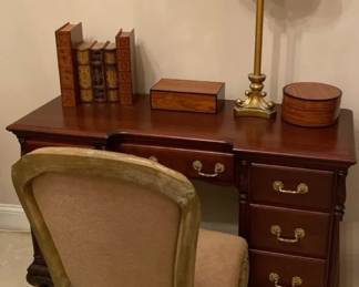 Wooden Desk With Decor And Chair