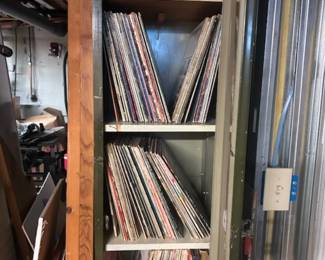LP's. Downstairs , bottom of stairs, sharp left, on right