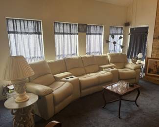 Leather style 4 recliner sectional 