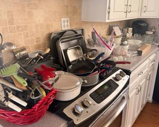 Assorted Kitchenware, Cookware, Small Appliances, and Range Hood