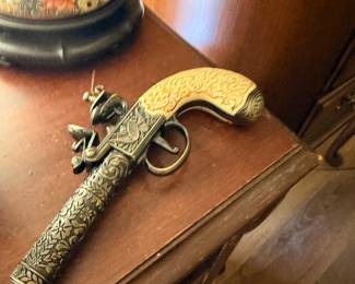 Decorative Flintlock Pistol with Carved Ivory Handle
