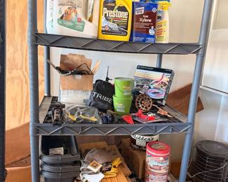 Assorted Household and Automotive Chemicals and Supplies on Shelving Unit