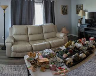 Lamps, sofa, grandfather clock, Flat screen, faux fireplace, stereo lots of furniture