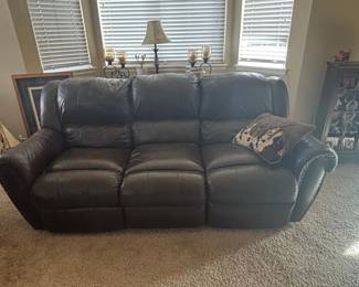 Brown Leather Reclining Sofa and Loveseat Set
