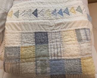 Patchwork Quilt with Geometric and Floral Motifs