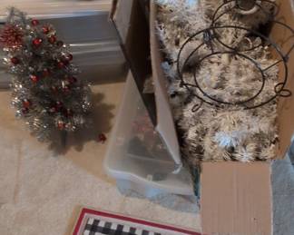 White Artificial Christmas Tree with Ornaments, Decorative Gift Box, and Red Truck "Seasons Greetings" Doormat