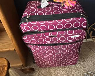 Rockland Purple and White Polka Dot Expandable Suitcase
