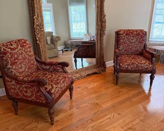 Pair of designer red and mahogany chairs 