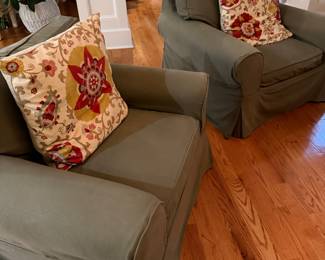 2 large pretty slip chairs with another set of covers. Red I believe 