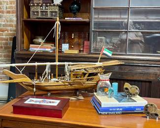 WOOD MODEL SHIP, INLAID BOX WITH SALMON, COFFEE TABLE BOOKS, ART GLASS, FOSSILS