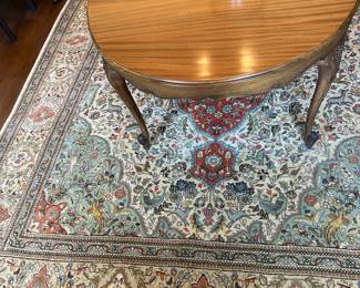 Rug.  Tans/Rusts/Blue/gray colors.