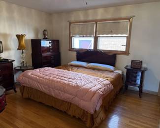 Beautiful cherry wood dresser with mirror, chest of drawers, full size headboard and nightstand.  Oriental style in almost perfect condition.