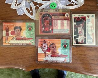 A small set of basketball cards, one signed