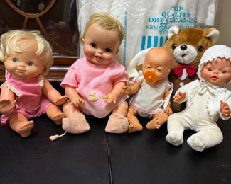 Scary dolls lined up, watching too much Chucky