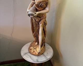 Gold painted plaster figure 