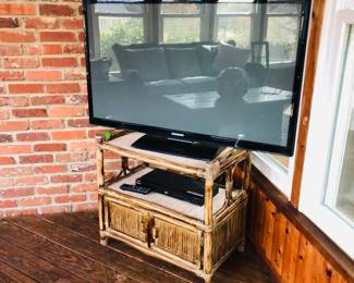 Samsung TV and Rattan Stand