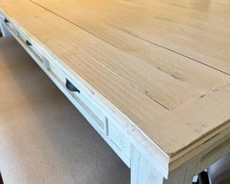 Has drawers that open on the side for flatware/linen storage +