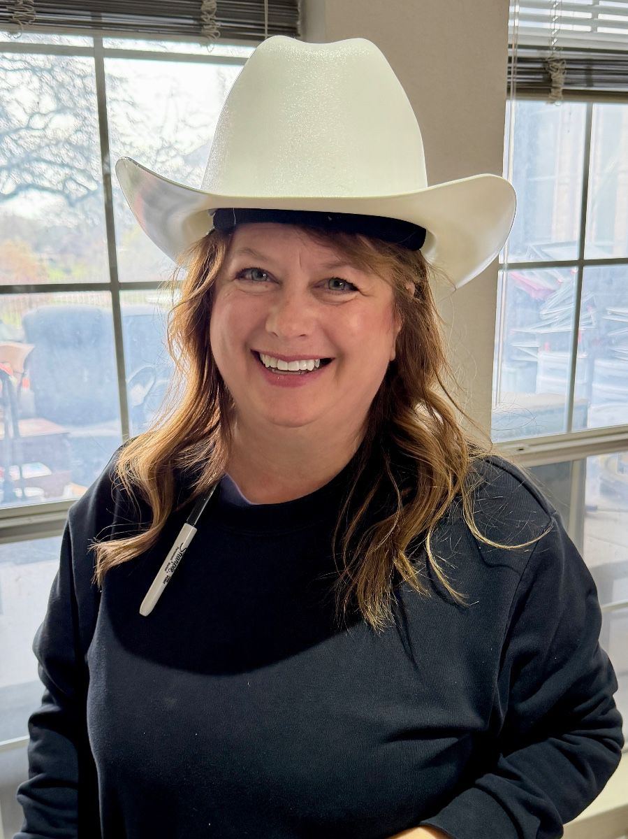 Stacie in a cowboy hard hat!