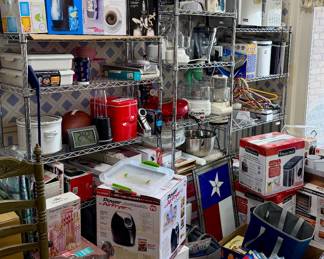 Tons of kitchen appliances new in box. 