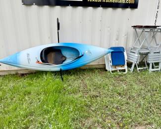 Otter kayak and stand.  We have two sets of paddles.