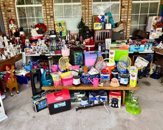 Back patio stuffed full!  Christmas, Dog, pet stuff, and garden, bug zappers, coolers.