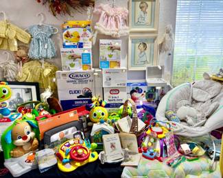 Baby section perfect for new moms or grandparents.  Many items new in box.