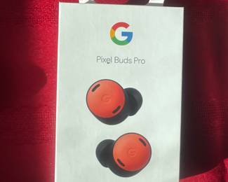 Boxed Google Pixel Buds Pro wireless earbuds with active noise cancellation in orange color.