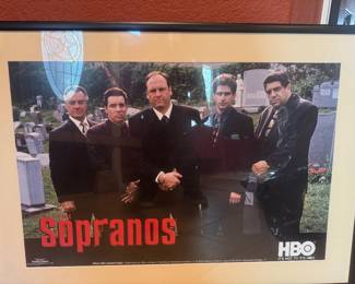 Framed picture of The Sopranos characters standing together with HBO logo.