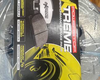 Packaged toy rocket kit labeled "Extreme" with yellow and black graphics.