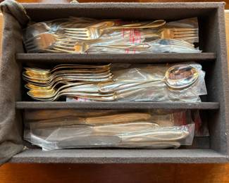 Sterling set as seen previous. Mint, never used... 47 pieces.
